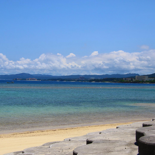 Okinawa beach view sand ocean clouds mountains 沖縄 夏 太陽 空 海 山 ビーチ